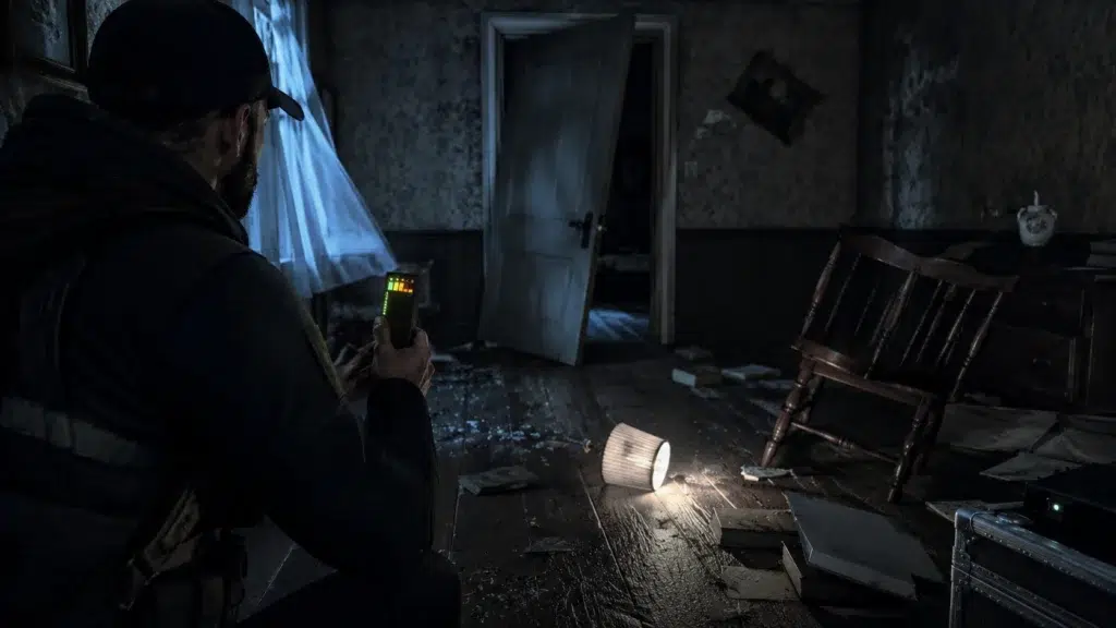 Paranormal investigator using an EMF meter during suspected poltergeist activity