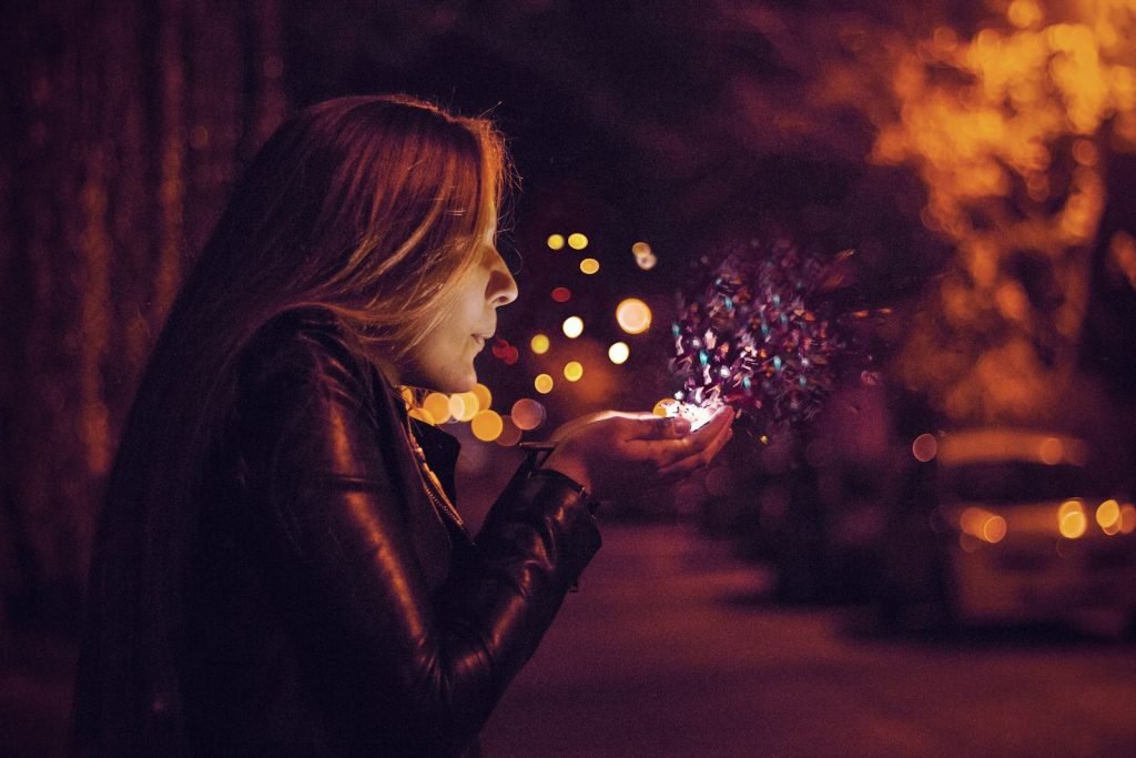 woman blowing sprinkle in her hand Chaos Magic