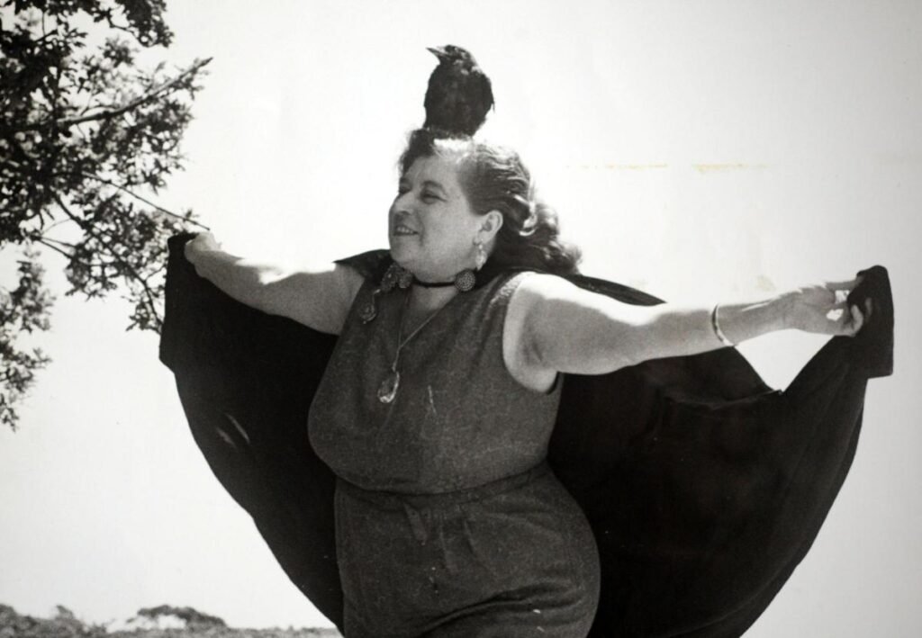Photo of Sybil Leek and her pet familiar jackdaw